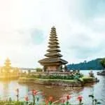 bali temple on the lake by guillaume meurice unsplash