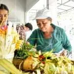 balinese women doing opening store ceremony