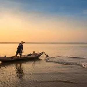 traditional fisherman fishing with net