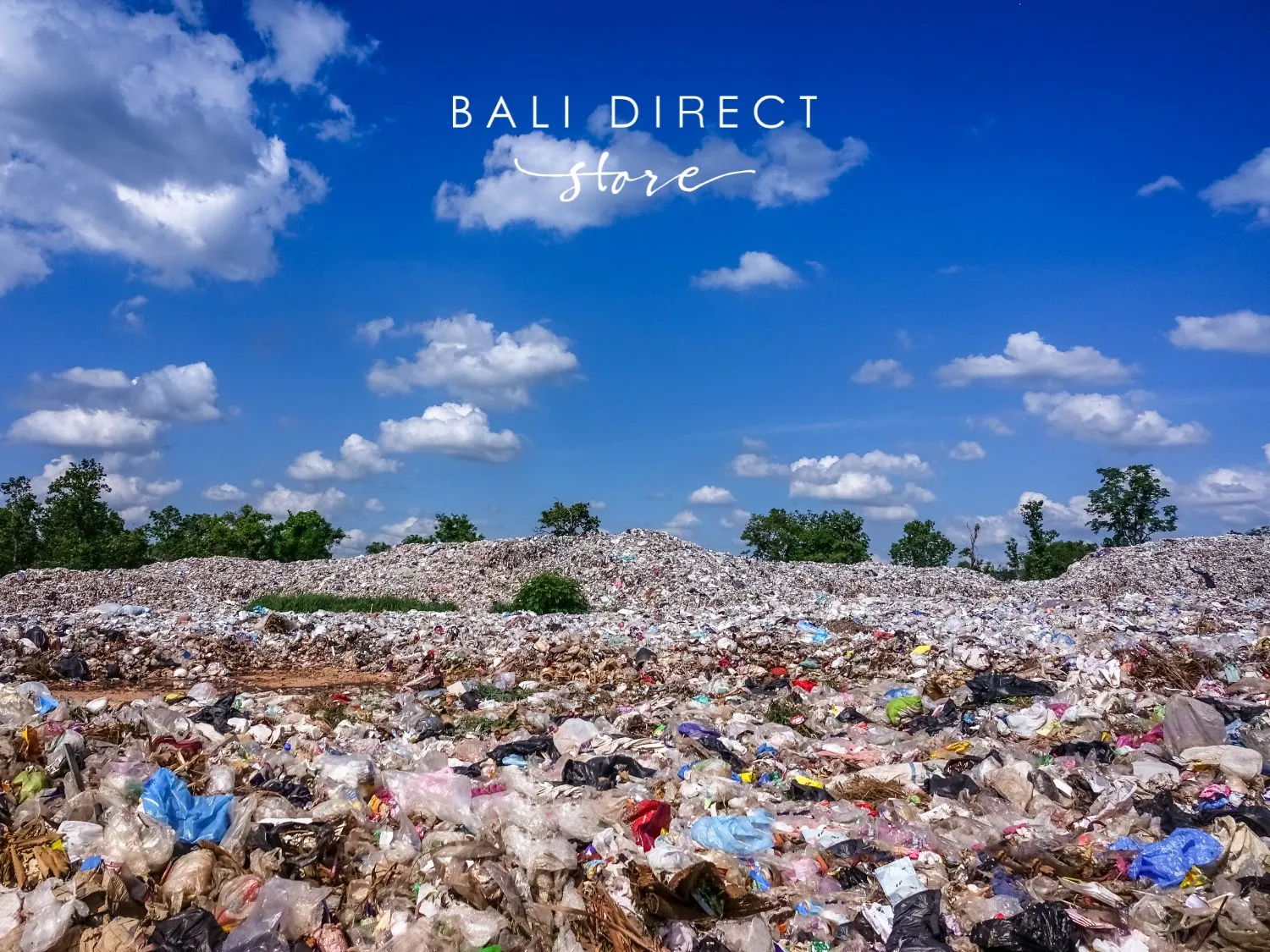 landfill in Bali with blue sky and garbage and waste